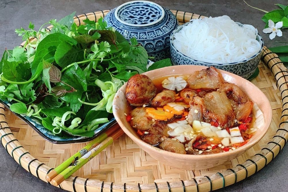 Bun Ca Hanoi. The Crucial Question: Bun Ca vs. Bun Cha – What's the Difference? First, What is a Bun Cha Hanoi? (The Famous One)