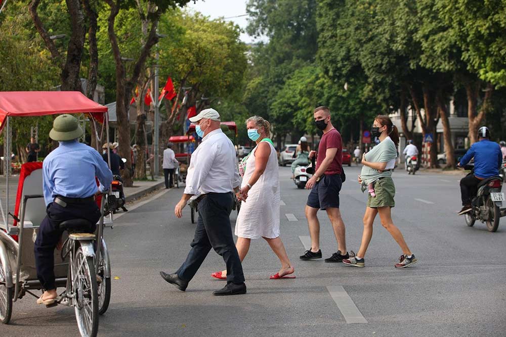 Crossing the street in Vietnam. Street-Savvy Wisdom: Tips and Tricks from Seasoned Travelers