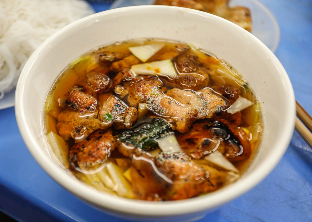 Hanoi Food. The Unmissable Dishes: Your Hanoi Food Bucket List. Bun Cha (Bún Chả): The Lunch of a Lifetime