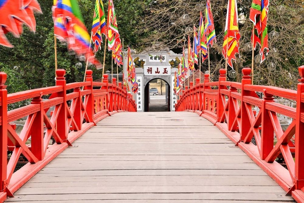 Hoan Kiem Lake. The Ultimate Checklist: Top Things to Do at Hoan Kiem Lake. Cross the Huc Bridge to Ngoc Son Temple