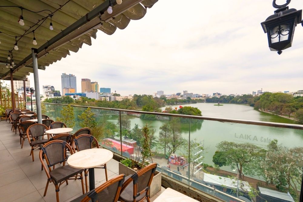 Hoan Kiem Lake. The Ultimate Checklist: Top Things to Do at Hoan Kiem Lake. People-Watch from a Cafe