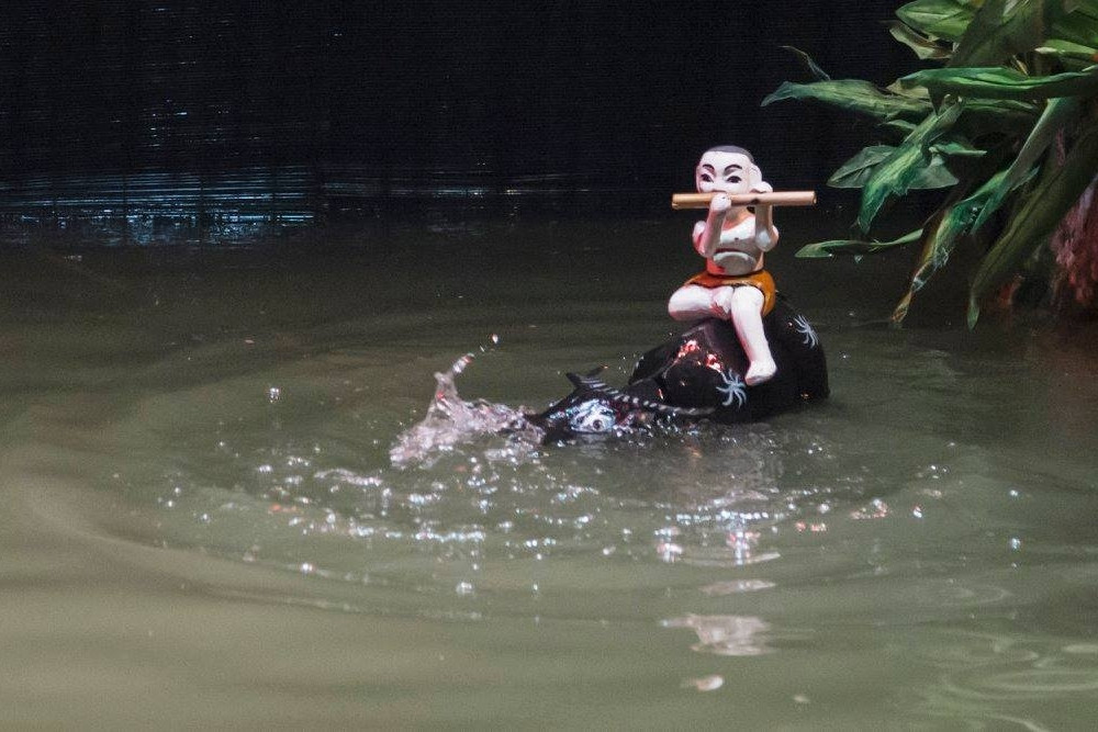 Water puppet theatre Hanoi - Buffalo herding and Flute Playing